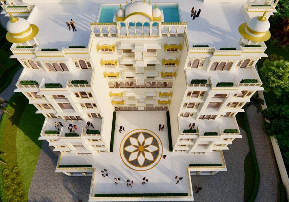 Aerial view of the palace with a rooftop pool and a floral mandala inlaid in the courtyard